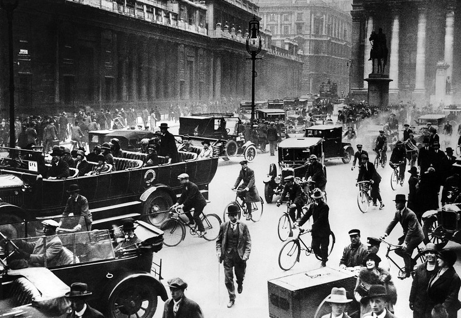 an old black and white photo of busy streets in the 1920’s