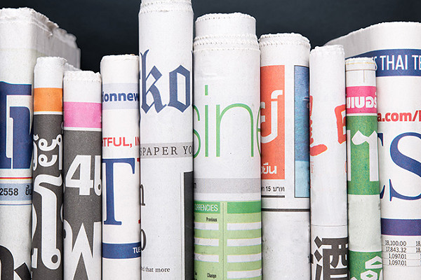 row of newspapers